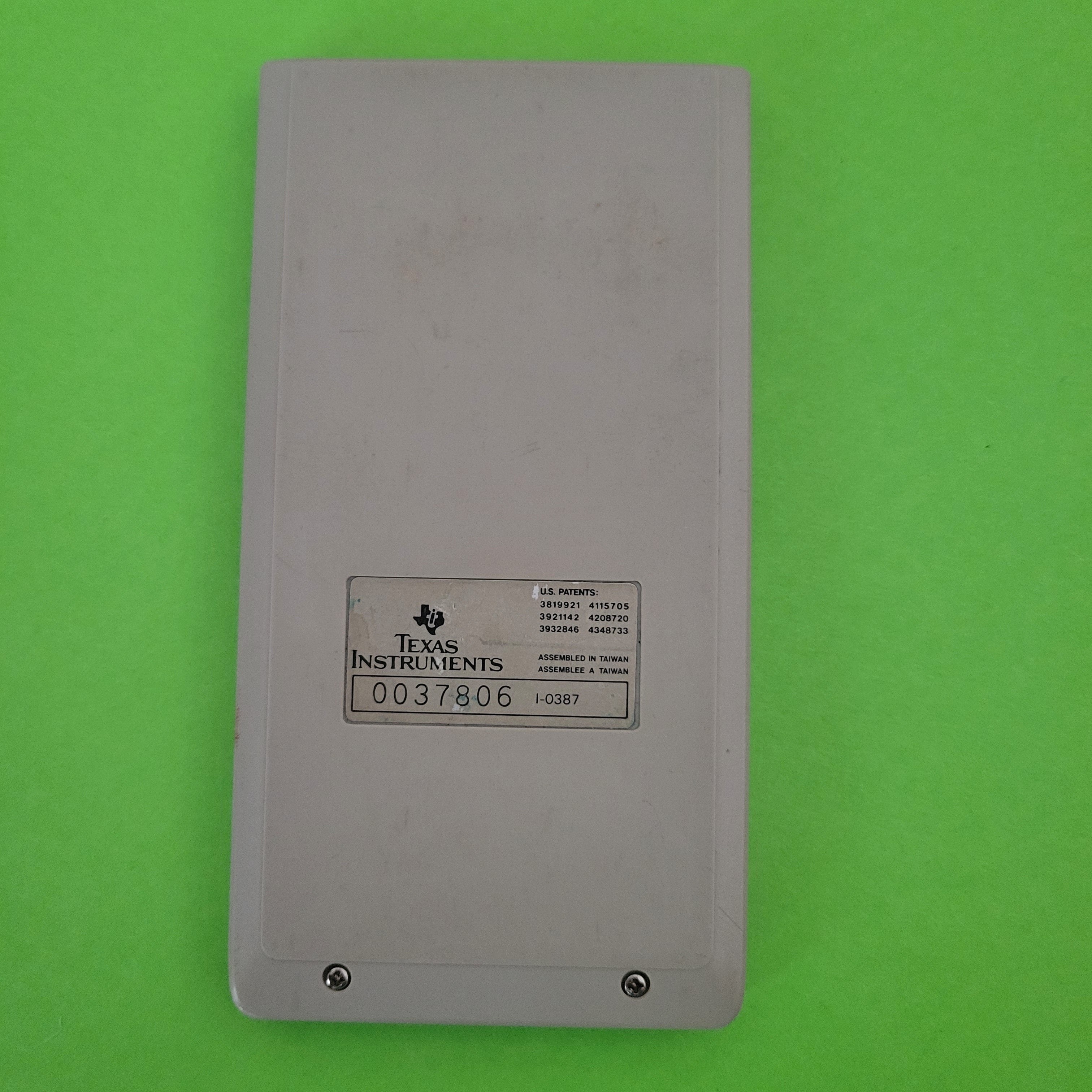 An image of the back of a texas instruments ti-36 solar scientific/engineering calculator